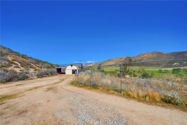 39100 Saddle Ridge Rd, Hemet, CA 92543 - view of road featuring a mountain view, a rural view, and dirt driveway