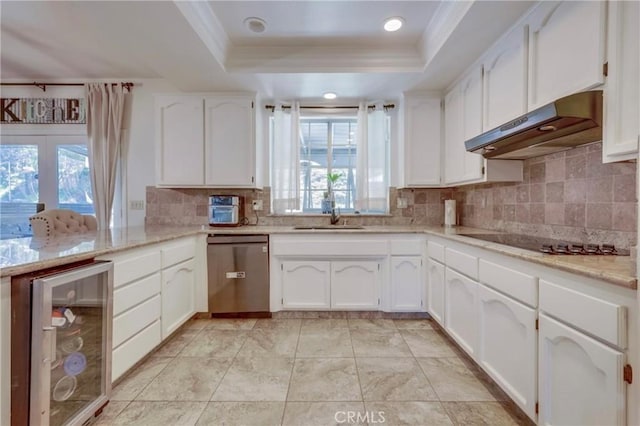 39100 Saddle Ridge Rd, Hemet, CA 92543 - kitchen featuring under cabinet range hood, wine cooler, stainless steel dishwasher, a raised ceiling, and a sink