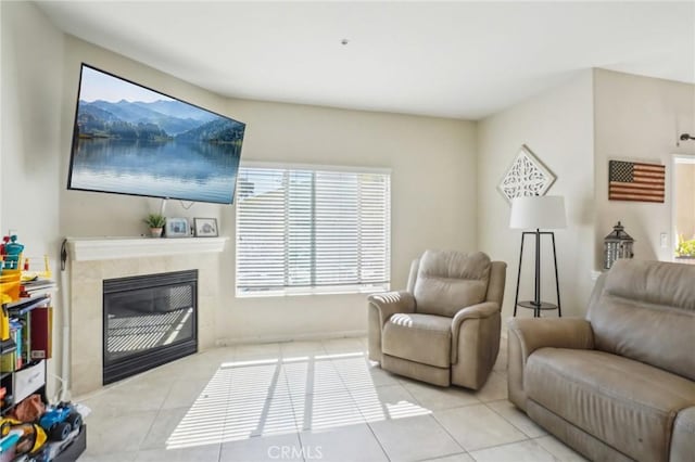 2810 Green River Rd Unit 103, Corona, CA 92882 - living room featuring light tile patterned floors and a tile fireplace
