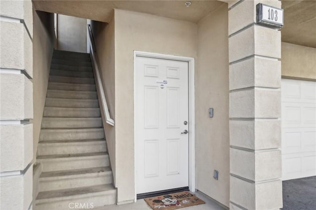 2810 Green River Rd Unit 103, Corona, CA 92882 - doorway to property featuring stucco siding
