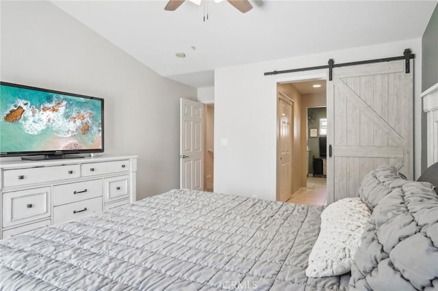 2810 Green River Rd Unit 103, Corona, CA 92882 - bedroom with a barn door, a ceiling fan, and recessed lighting