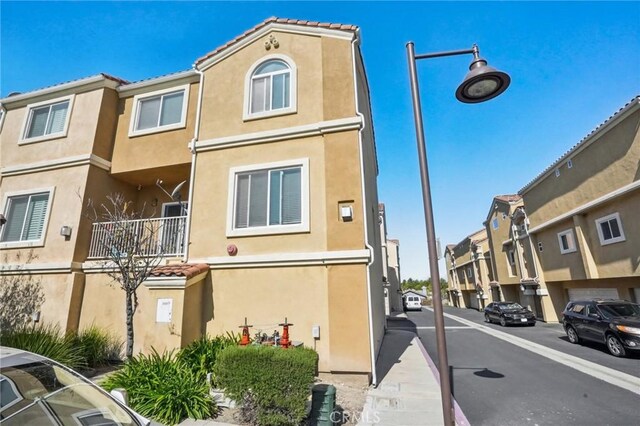 2810 Green River Rd Unit 103, Corona, CA 92882 - view of road with a residential view