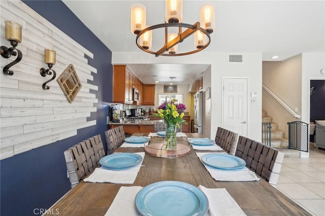 2810 Green River Rd Unit 103, Corona, CA 92882 - dining space featuring a chandelier, stairs, and recessed lighting