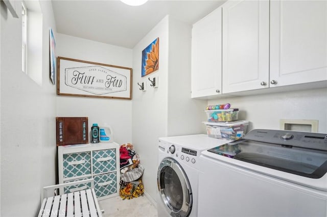 2810 Green River Rd Unit 103, Corona, CA 92882 - clothes washing area with cabinet space and washer and clothes dryer