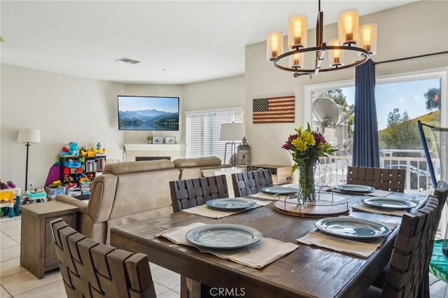 2810 Green River Rd Unit 103, Corona, CA 92882 - dining space with a chandelier and light tile patterned floors