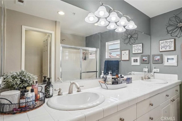 2810 Green River Rd Unit 103, Corona, CA 92882 - bathroom with a shower stall and double vanity
