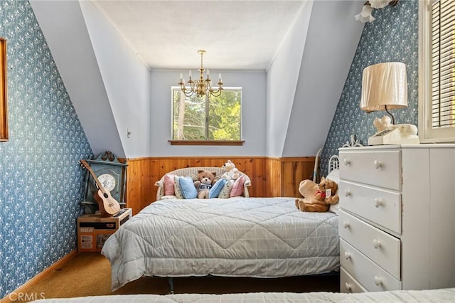 bedroom featuring a wainscoted wall, carpet floors, and wallpapered walls