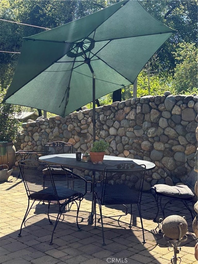 view of patio with outdoor dining area