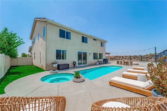 148 Mesquite Ct, Calimesa, CA 92320 - view of pool with a patio area, a fenced backyard, a fenced in pool, and an in ground hot tub