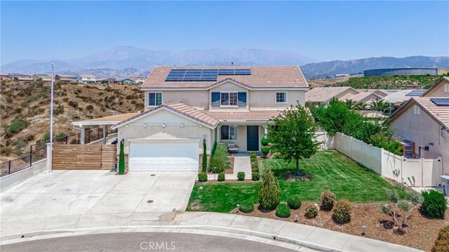 148 Mesquite Ct, Calimesa, CA 92320 - traditional-style house with a front yard, stucco siding, a tiled roof, fence private yard, and a mountain view