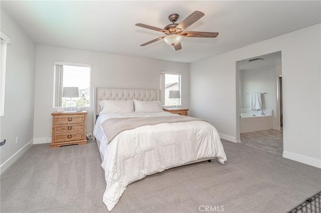 148 Mesquite Ct, Calimesa, CA 92320 - carpeted bedroom with a ceiling fan and ensuite bath