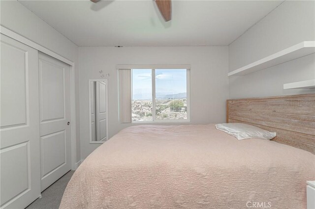148 Mesquite Ct, Calimesa, CA 92320 - bedroom with a closet, carpet floors, and ceiling fan