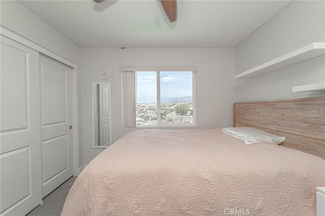148 Mesquite Ct, Calimesa, CA 92320 - carpeted bedroom featuring a closet and ceiling fan