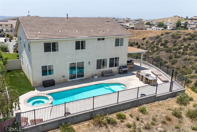 148 Mesquite Ct, Calimesa, CA 92320 - view of pool featuring a fenced backyard, a patio area, area for grilling, and a pool with connected hot tub