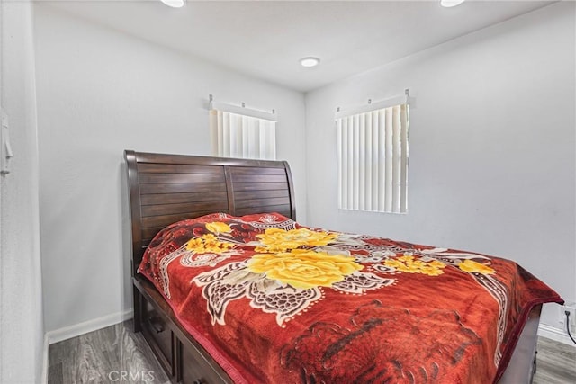 24412 Eucalyptus Ave, Moreno Valley, CA 92553 - bedroom featuring wood finished floors, baseboards, and recessed lighting
