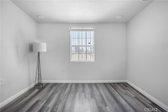 24412 Eucalyptus Ave, Moreno Valley, CA 92553 - unfurnished room with wood finished floors and baseboards