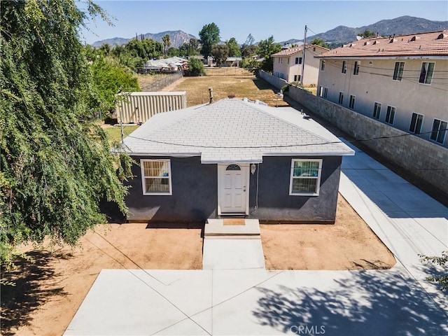 24412 Eucalyptus Ave, Moreno Valley, CA 92553 - view of front of home with a mountain view and stucco siding