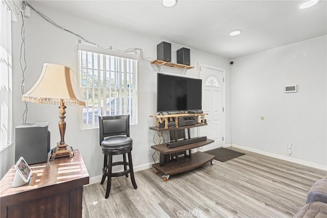 24412 Eucalyptus Ave, Moreno Valley, CA 92553 - living room featuring healthy amount of natural light, wood finished floors, baseboards, and recessed lighting