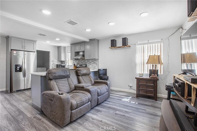 24412 Eucalyptus Ave, Moreno Valley, CA 92553 - living room with baseboards, light wood-style floors, recessed lighting, and beamed ceiling