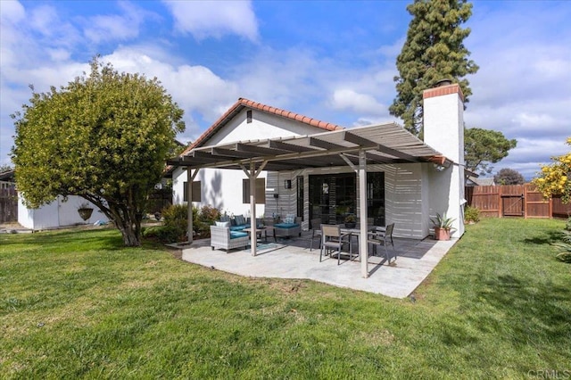 rear view of house with fence, a yard, a pergola, a patio area, and an outdoor hangout area