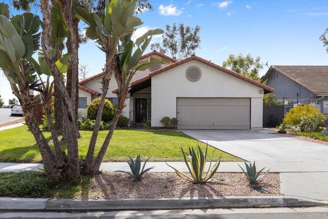 view of front facade featuring an attached garage, stucco siding, concrete driveway, a front lawn, and a tiled roof