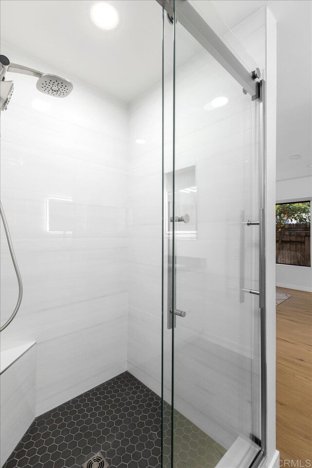 full bathroom featuring a stall shower