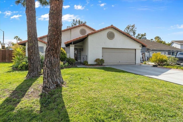 view of front of home with a front yard, driveway, an attached garage, stucco siding, and a tiled roof