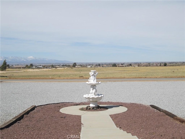 exterior space featuring a mountain view