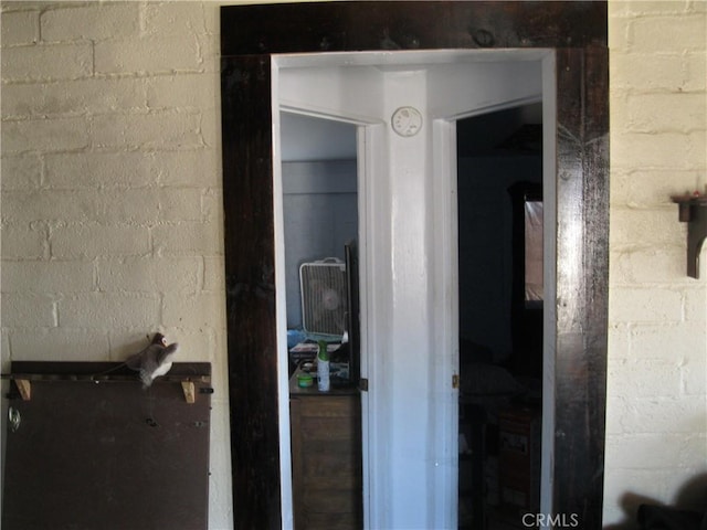 interior space featuring concrete block wall