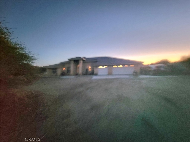garage with driveway