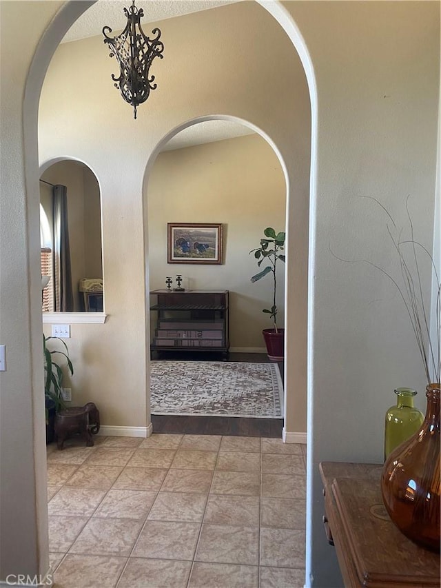 corridor with arched walkways