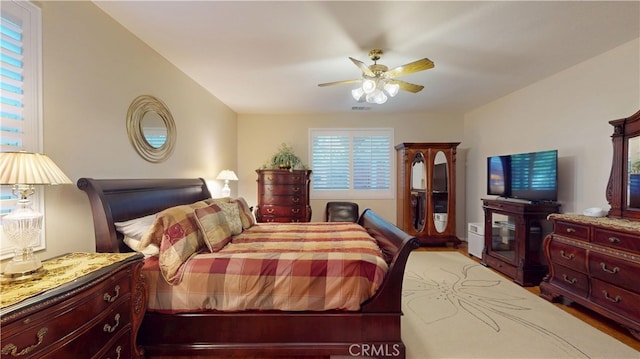 bedroom featuring visible vents and a ceiling fan