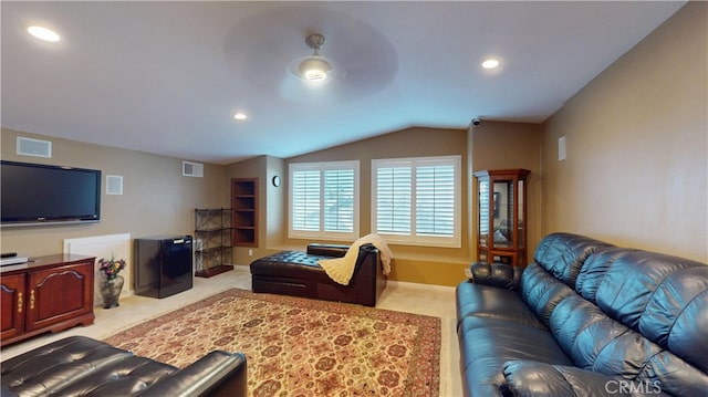 carpeted living room featuring lofted ceiling, recessed lighting, baseboards, and visible vents