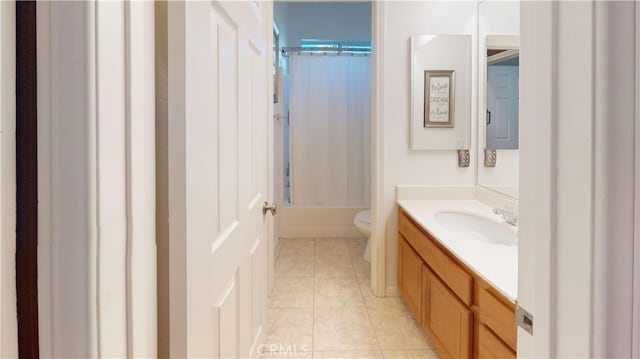 full bath with tile patterned flooring, toilet, vanity, and shower / tub combo with curtain
