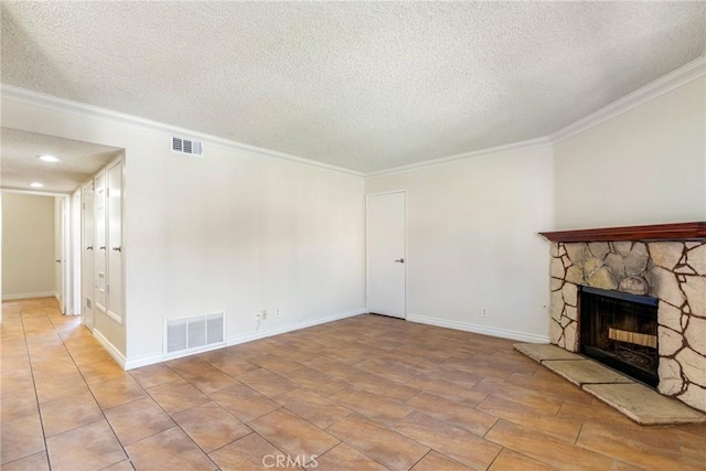 1251 S Meadow Ln Unit 145, Colton, CA 92324 - unfurnished living room with a textured ceiling, ornamental molding, a stone fireplace, and baseboards