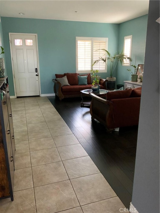 5230 Starling St, Fontana, CA 92336 - living room with a wealth of natural light, light tile patterned floors, and baseboards