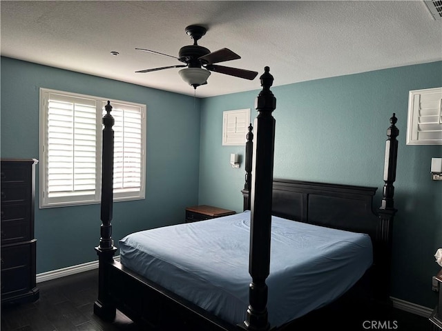 5230 Starling St, Fontana, CA 92336 - bedroom featuring a textured ceiling, ceiling fan, baseboards, and visible vents