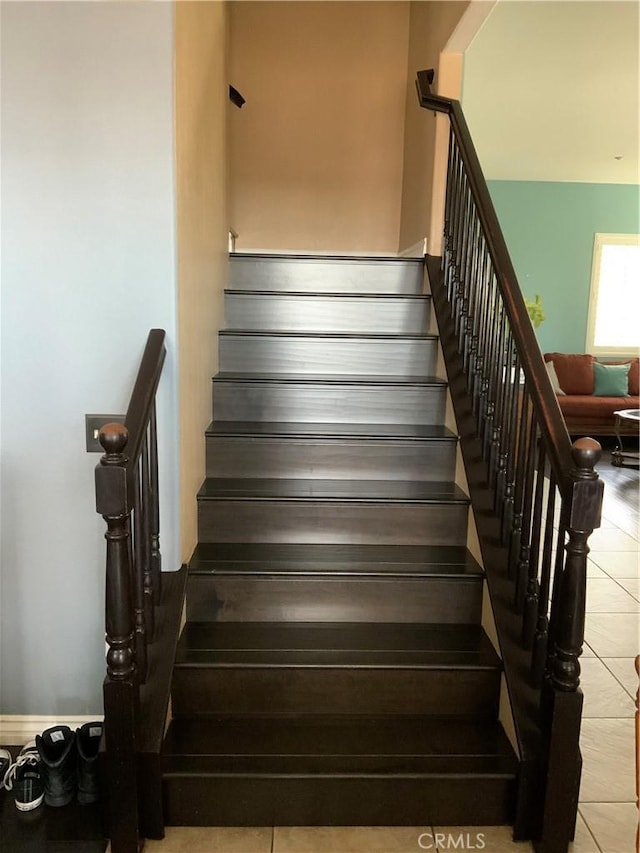5230 Starling St, Fontana, CA 92336 - stairs featuring tile patterned floors
