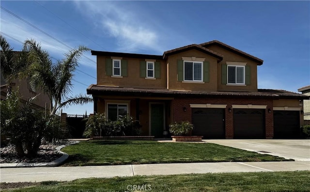 5230 Starling St, Fontana, CA 92336 - view of front of home featuring driveway, stucco siding, an attached garage, and a front lawn
