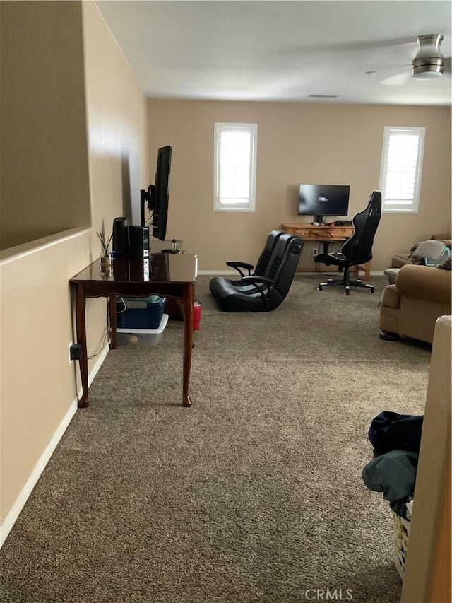 5230 Starling St, Fontana, CA 92336 - carpeted home office with a wealth of natural light, baseboards, and a ceiling fan