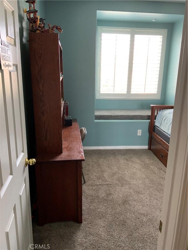 5230 Starling St, Fontana, CA 92336 - office area with plenty of natural light, baseboards, and carpet floors