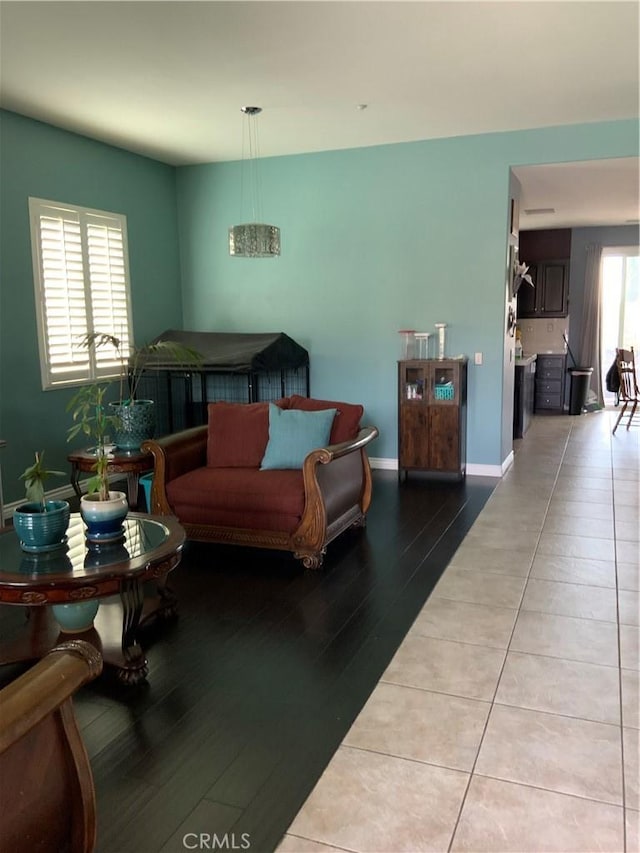 5230 Starling St, Fontana, CA 92336 - living area featuring wood finished floors and baseboards
