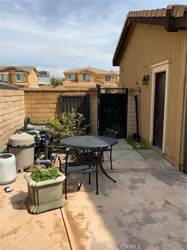5230 Starling St, Fontana, CA 92336 - view of patio / terrace with outdoor dining area and fence