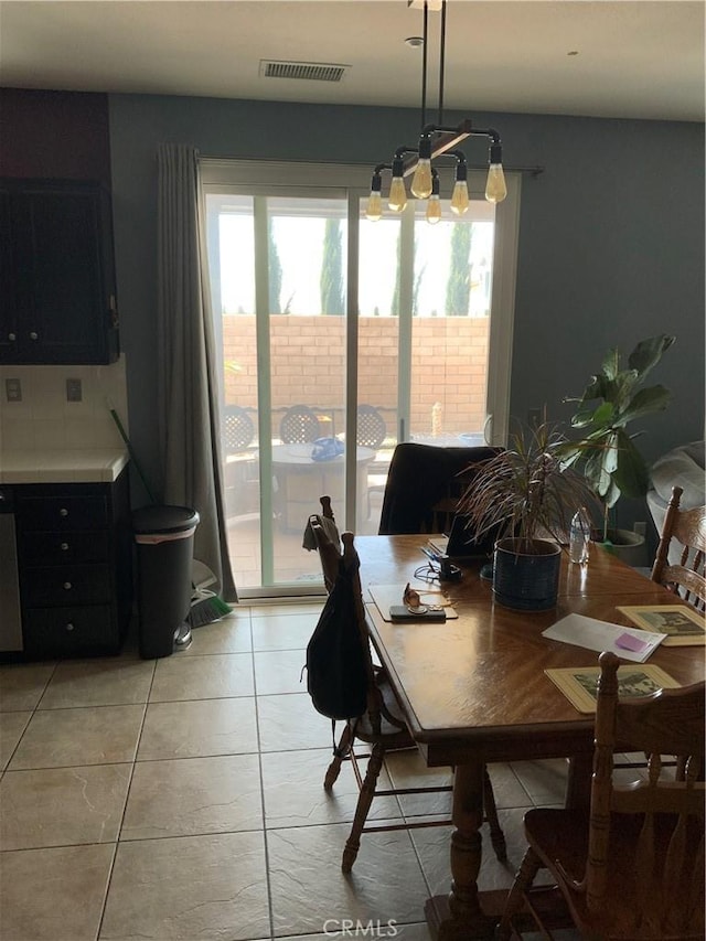 5230 Starling St, Fontana, CA 92336 - dining area with light tile patterned floors and visible vents