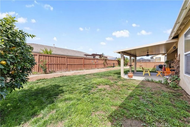 28183 Rocky Cove Dr, Menifee, CA 92585 - fenced backyard featuring a patio and ceiling fan