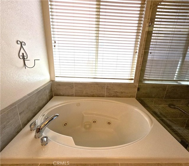 28183 Rocky Cove Dr, Menifee, CA 92585 - bathroom with a jetted tub and plenty of natural light