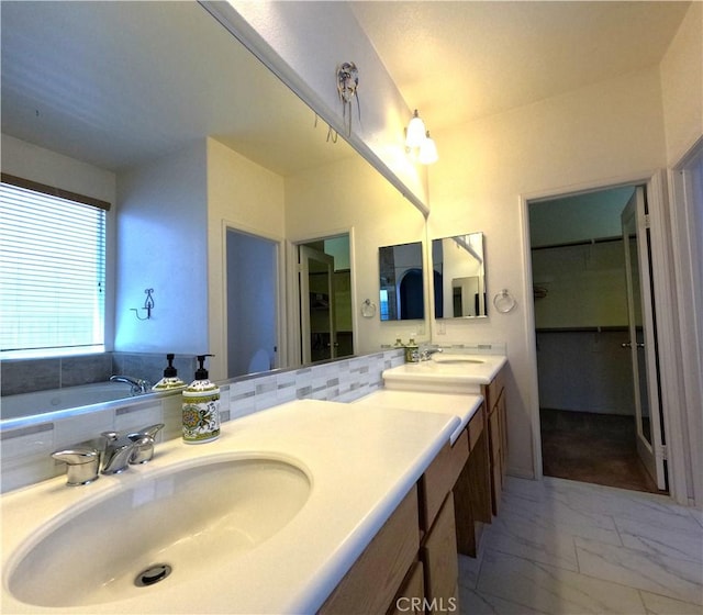 28183 Rocky Cove Dr, Menifee, CA 92585 - bathroom featuring double vanity, a spacious closet, marble look tile flooring, and a bath