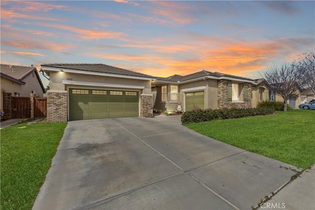 28183 Rocky Cove Dr, Menifee, CA 92585 - prairie-style house featuring stucco siding, an attached garage, and concrete driveway