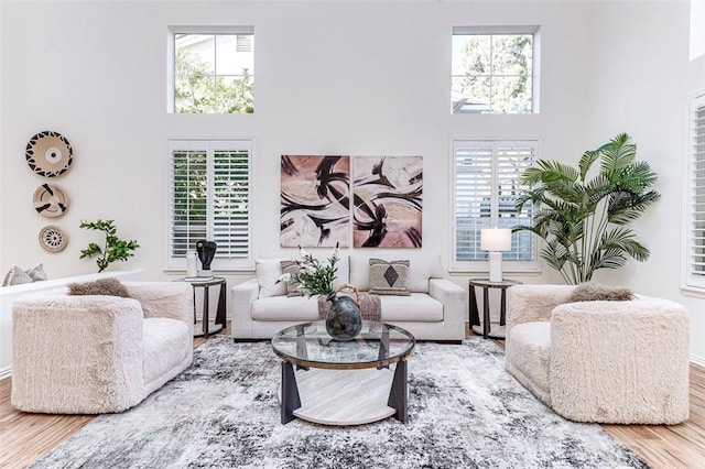 2768 Somerset Pl, Rowland Heights, CA 91748 - living area with a towering ceiling, wood finished floors, and a healthy amount of sunlight