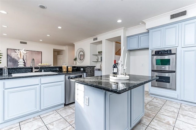 2768 Somerset Pl, Rowland Heights, CA 91748 - kitchen with crown molding, a sink, dark stone counters, stainless steel appliances, and visible vents